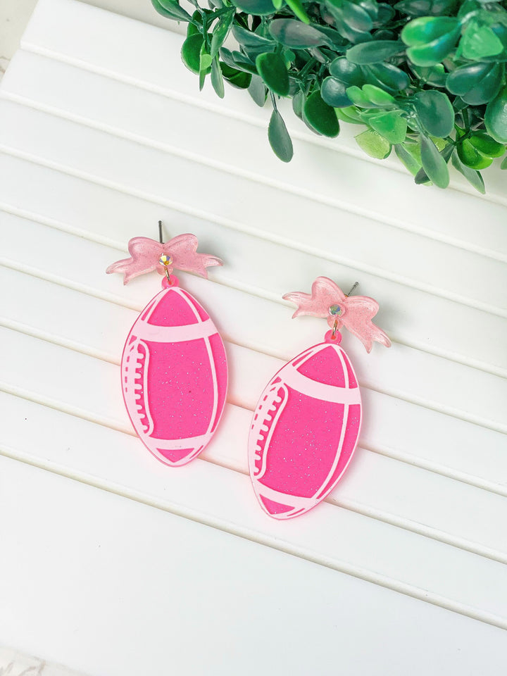 PREORDER: Football Bow Drop Earrings In Two Colors